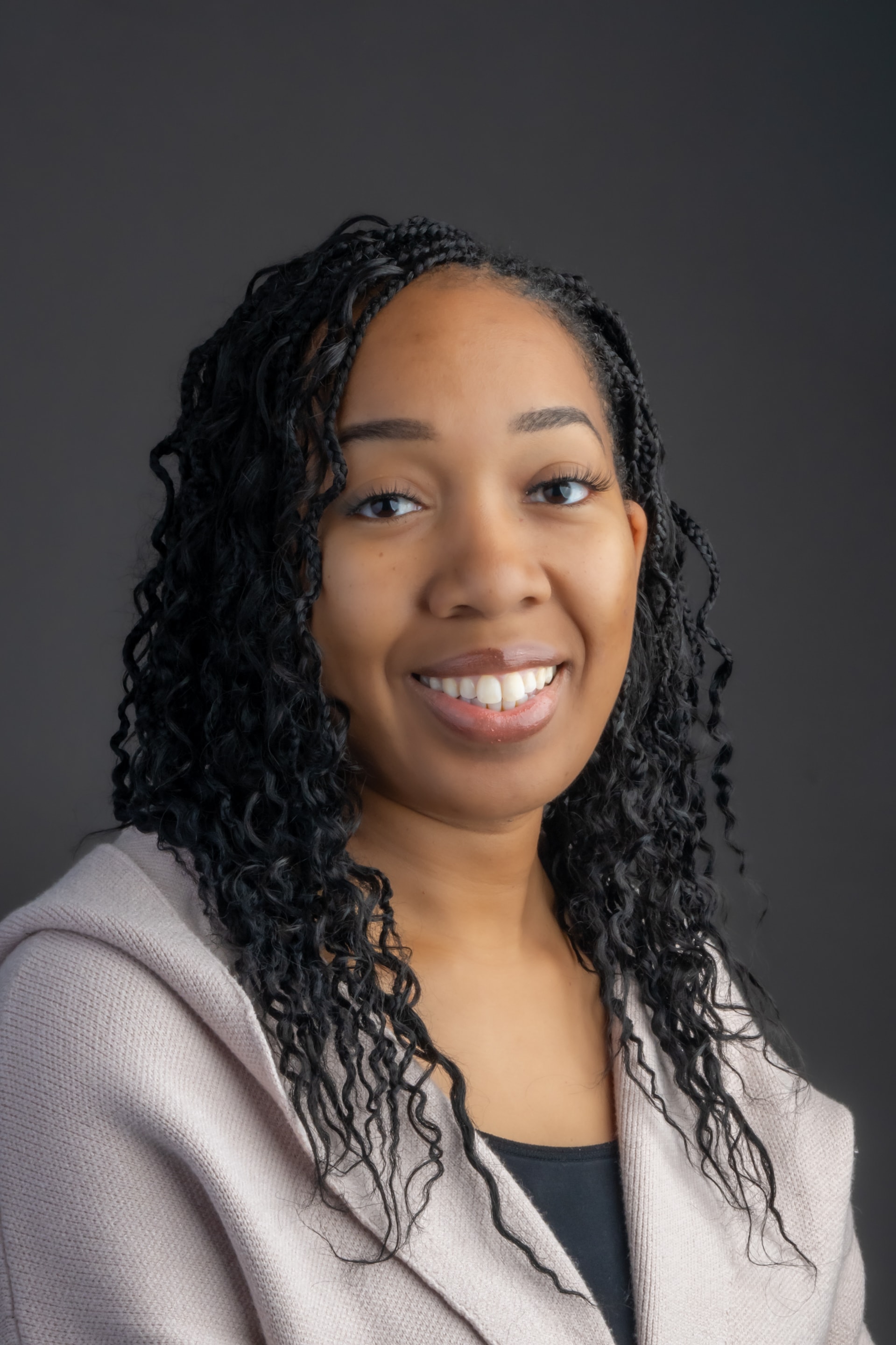 Ralleda Hayes, founder of The Braid and Beauty Bar LLC — Licensed Hair Braider and Community Wellness Advocate